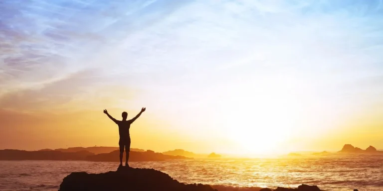 Sunrise with someone welcoming the new sun