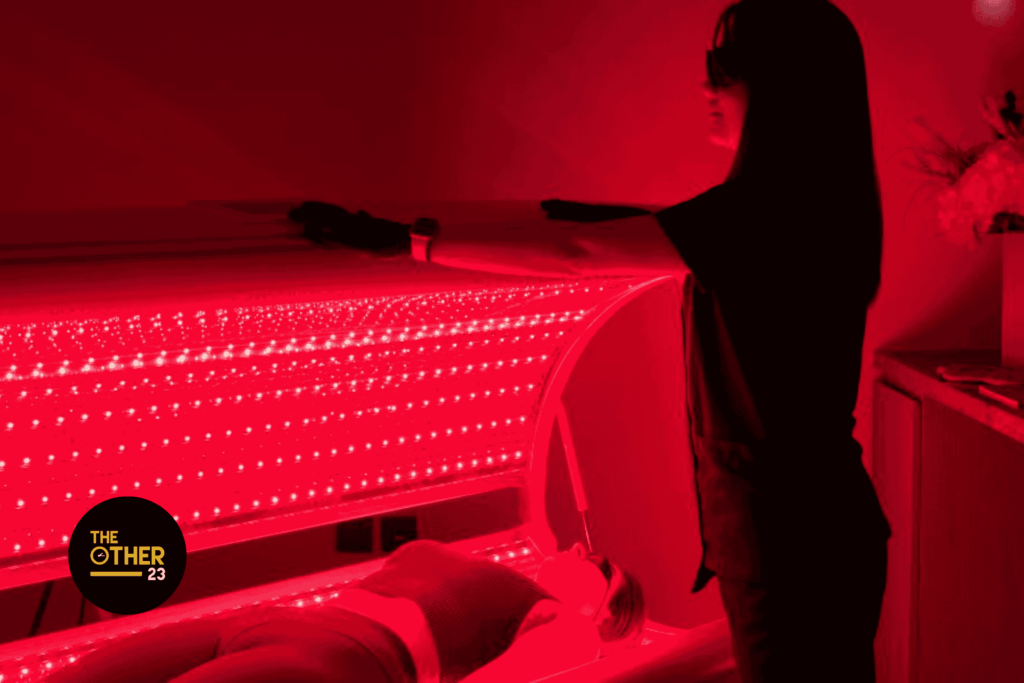 Red Light Therapy and Non-Surgical Anti-Aging 14 a woman in a red light bed