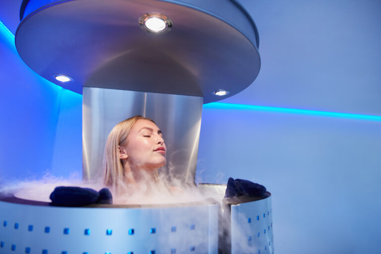 Young woman in cryotherapy machine